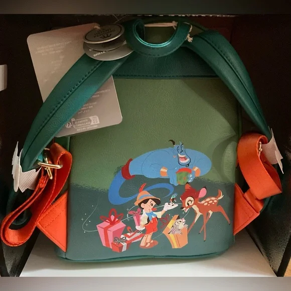 Disney: Loungefly Classic Christmas glow in the dark mini backpack green &orange - Picture 2 of 9